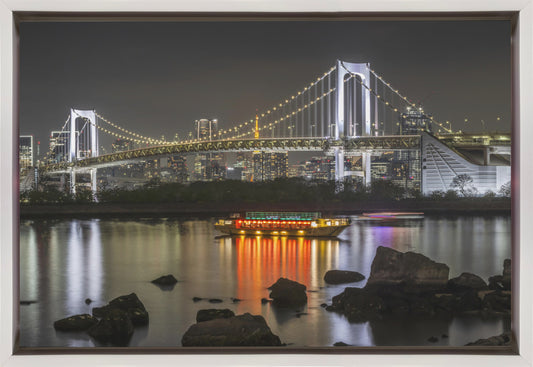 Striking Rainbow Bridge with Tokyo Skyline in the evening - Panorama Wall Artwork In Black Floating Frame